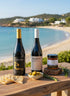 Box degustazione "Sunset Villasimius" with artisanal Sardinian white wine, sparkling drink, and rare honey
