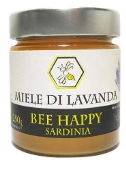 Barattolo di miele di lavanda giallo dorato con consistenza cremosa e riflessi ambrati