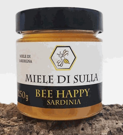 Vaso di miele di Sulla cremoso prodotto dalle api in Sardegna da fiori di Hedysarum coronarium selvatici