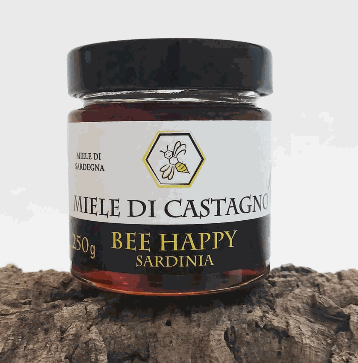 Barattolo di Miele di Castagno ambrato scuro da Belvì, Sardegna, con aroma intenso e consistenza cremosa o liquida naturale