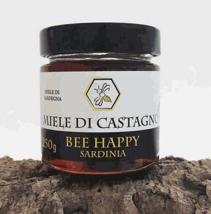 Barattolo di Miele di Castagno ambrato scuro da Belvì, Sardegna, con aroma intenso e consistenza cremosa o liquida naturale